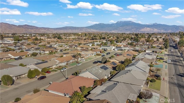 drone / aerial view featuring a mountain view