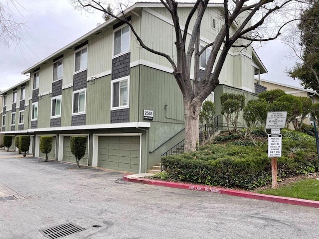 view of building exterior featuring a garage