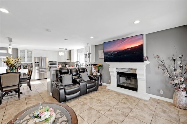 living room with light tile patterned floors