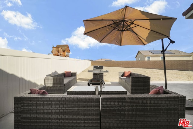 view of patio featuring outdoor lounge area and area for grilling