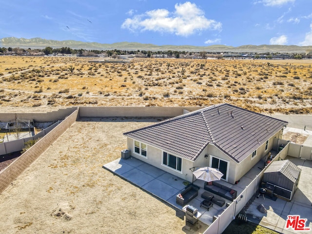 aerial view featuring a mountain view