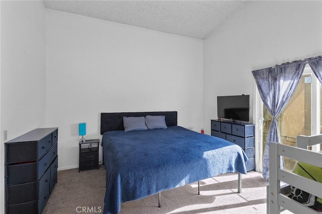 carpeted bedroom with a textured ceiling