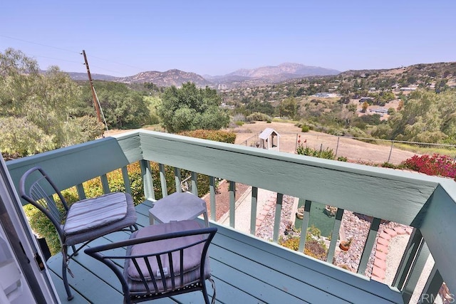 balcony featuring a mountain view