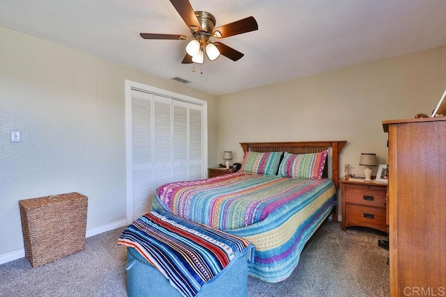 carpeted bedroom with a closet and ceiling fan