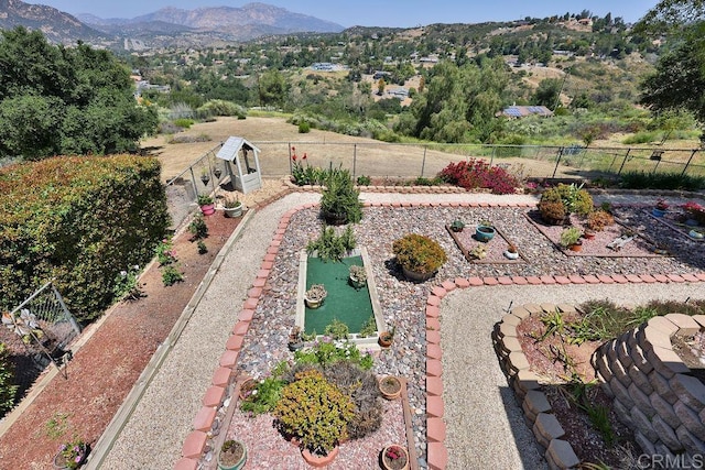 exterior space featuring a mountain view