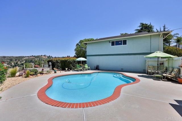 view of pool with a patio