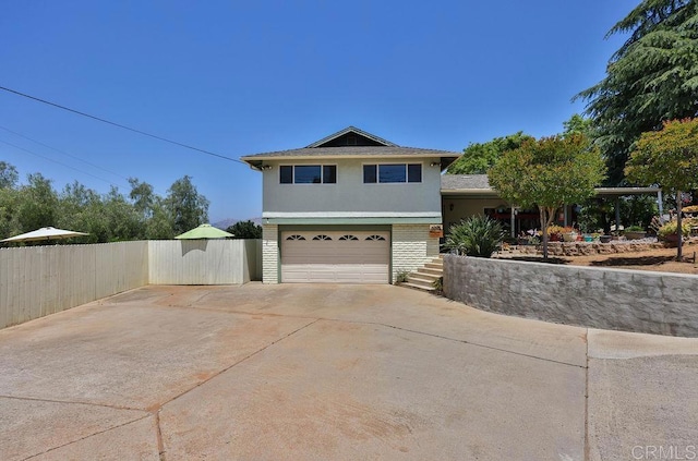 split level home with a garage