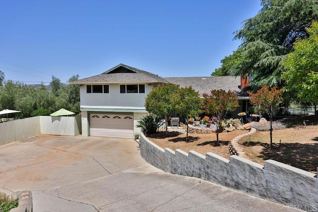 view of front of home featuring a garage