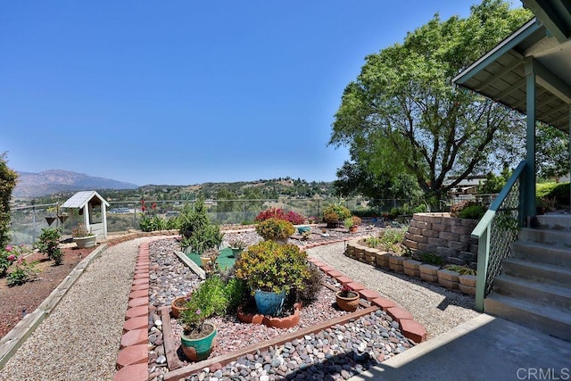 view of yard with a mountain view