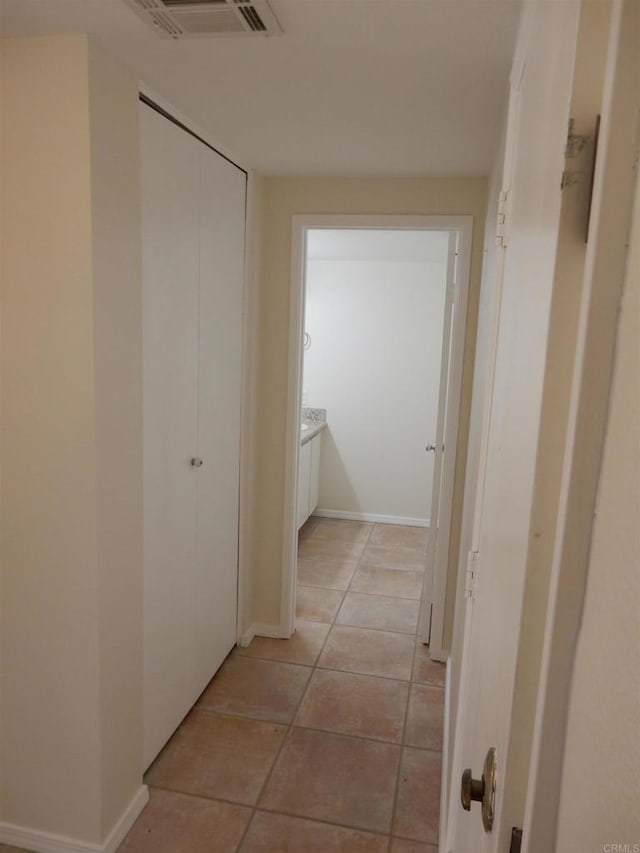 2374 Caringa Unit B, Carlsbad, CA 92009 - corridor with light tile patterned floors
