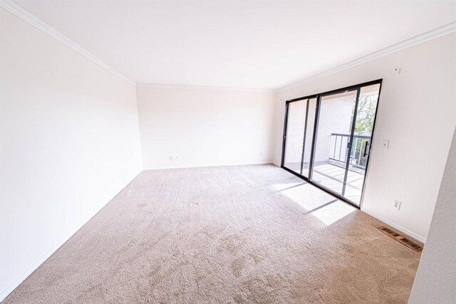 2374 Caringa Unit B, Carlsbad, CA 92009 - carpeted spare room with crown molding