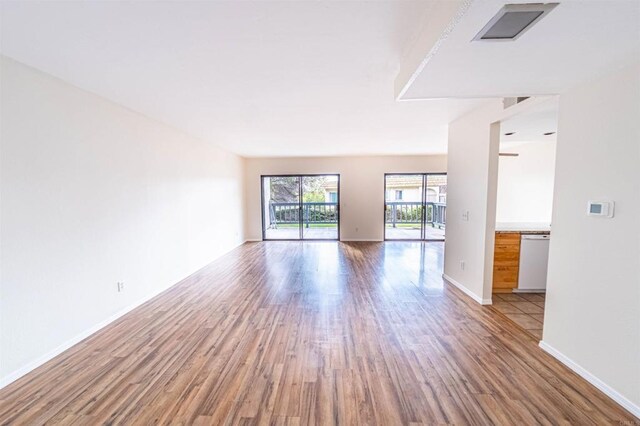 2374 Caringa Unit B, Carlsbad, CA 92009 - spare room featuring hardwood / wood-style flooring