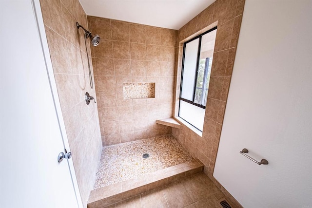 2374 Caringa Unit B, Carlsbad, CA 92009 - bathroom with a tile shower and tile patterned flooring