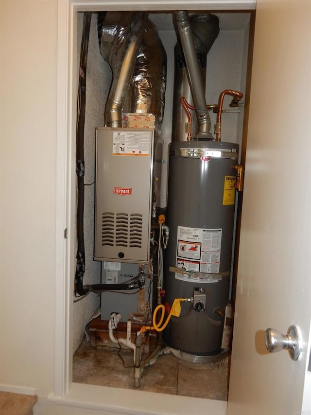 2374 Caringa Unit B, Carlsbad, CA 92009 - utility room with secured water heater