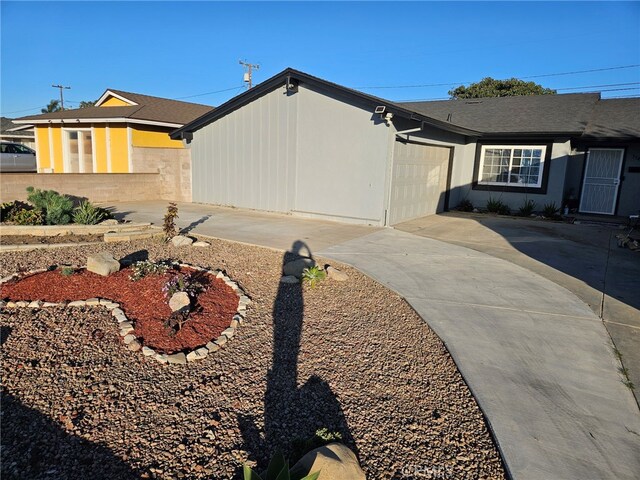 view of property exterior featuring a garage