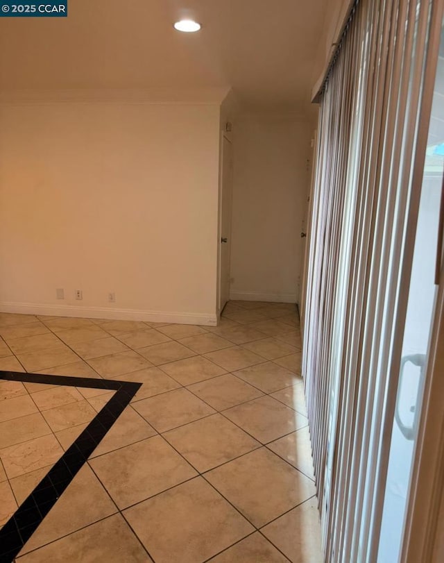 corridor with light tile patterned floors