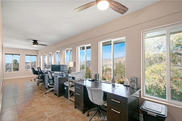 office area featuring ceiling fan and light tile patterned floors