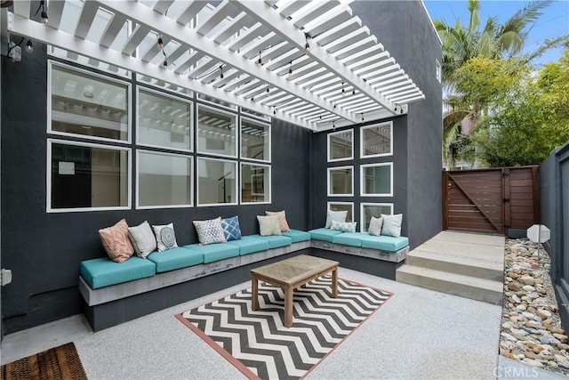 view of patio / terrace featuring a pergola and outdoor lounge area