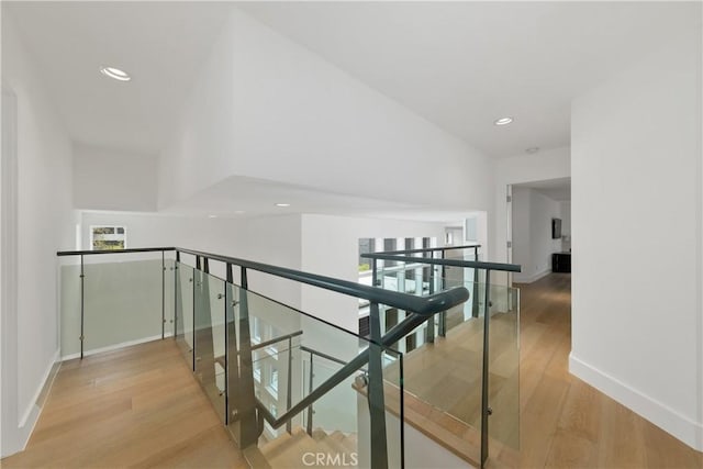 3308 Pacific Ave, Manhattan Beach, CA 90266 - hall with an upstairs landing, wood finished floors, baseboards, and recessed lighting