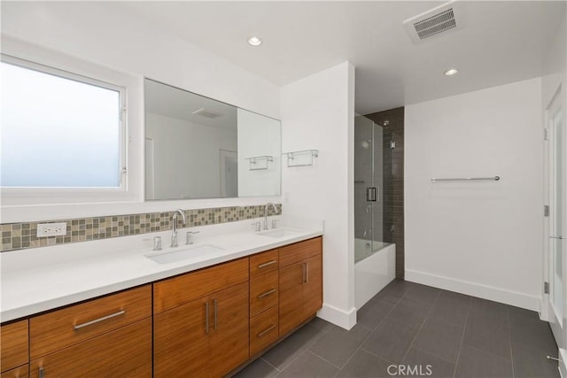 bathroom featuring vanity, decorative backsplash, tile patterned floors, and independent shower and bath