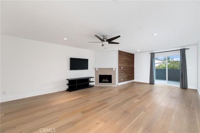 3308 Pacific Ave, Manhattan Beach, CA 90266 - unfurnished living room featuring a ceiling fan, a fireplace, recessed lighting, baseboards, and light wood-style floors