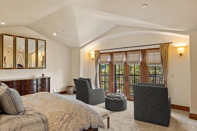 carpeted bedroom featuring vaulted ceiling and access to outside