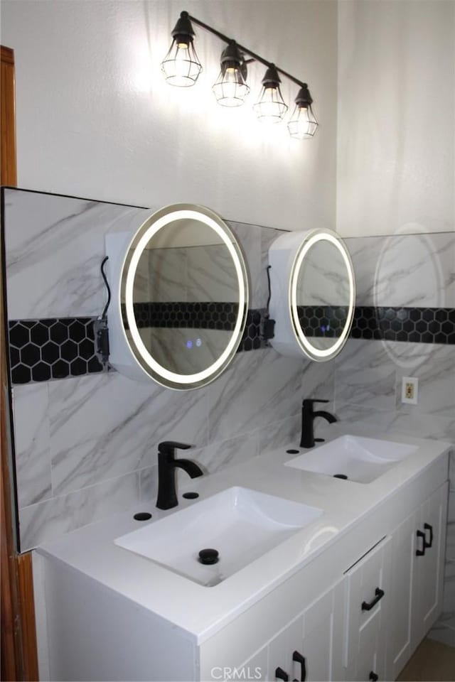 bathroom with vanity and decorative backsplash