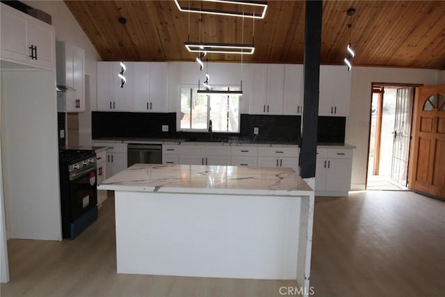 kitchen featuring dishwasher, a center island, white cabinetry, stainless steel electric stove, and light stone counters