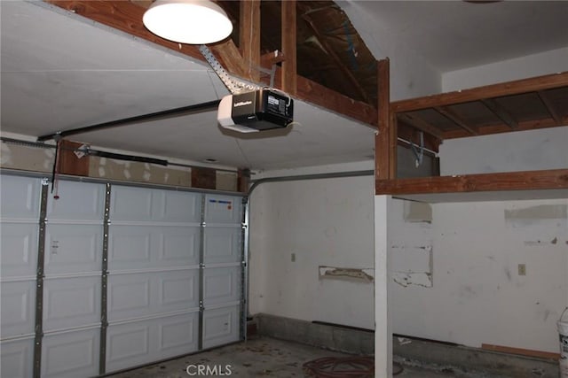 garage featuring a garage door opener