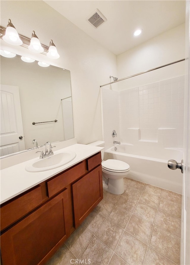 full bathroom featuring toilet, vanity, and  shower combination