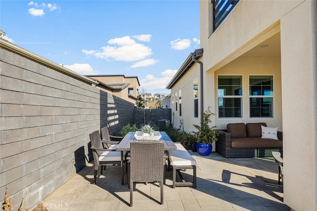 view of patio featuring central air condition unit