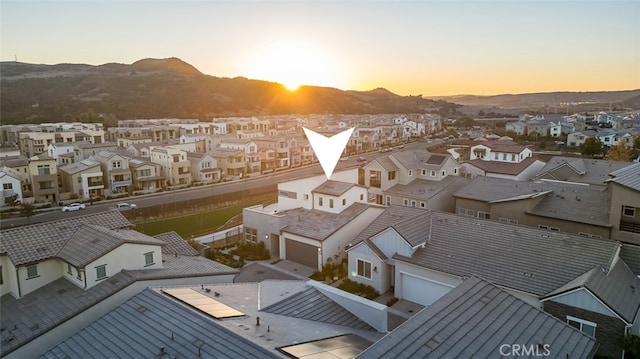 aerial view at dusk with a mountain view