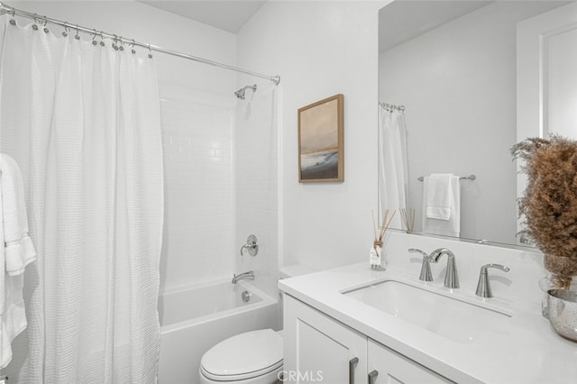 full bathroom featuring shower / bath combination with curtain, vanity, and toilet