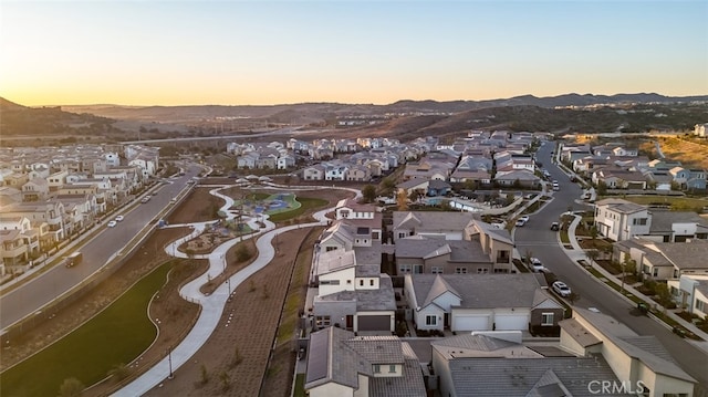 aerial view at dusk with a mountain view