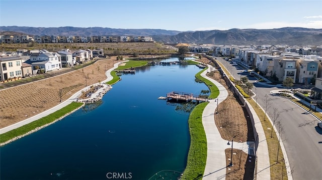 aerial view with a water and mountain view