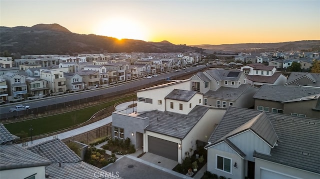 aerial view at dusk with a mountain view