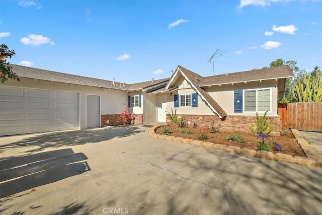 single story home featuring a garage