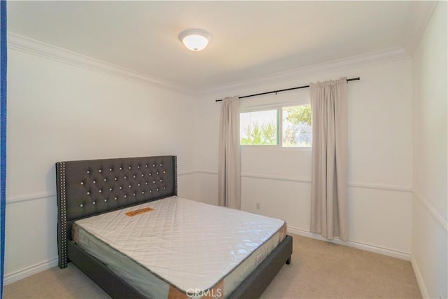 carpeted bedroom with crown molding