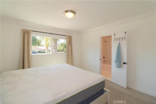 bedroom featuring ornamental molding and light carpet