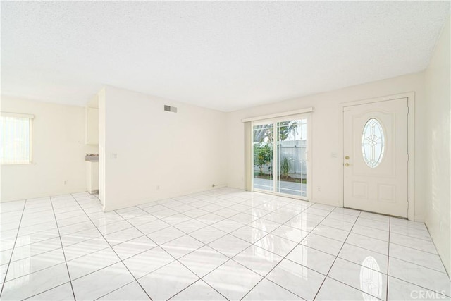 view of tiled entrance foyer