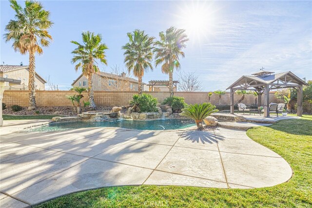 view of swimming pool featuring a patio area, a gazebo, and pool water feature