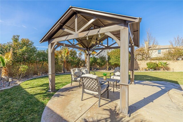 view of patio featuring an outdoor hangout area and a gazebo