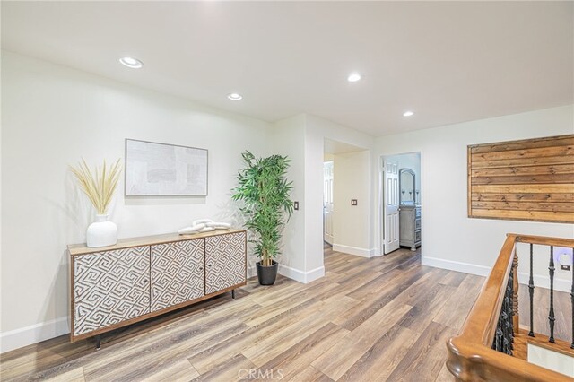 hallway featuring hardwood / wood-style floors