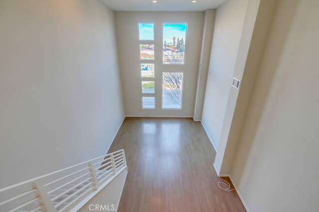 doorway with light wood-type flooring