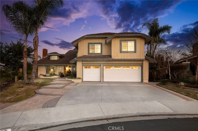 front of property with a garage