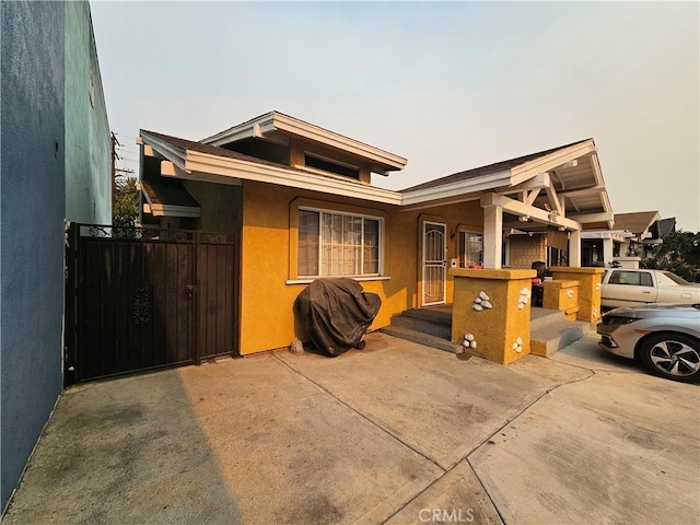 view of front of property featuring a patio