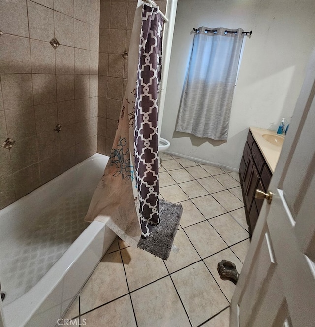 bathroom with vanity, shower / bathtub combination with curtain, and tile patterned flooring