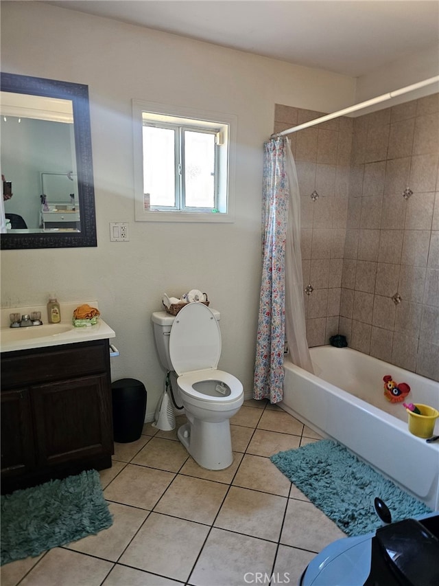 full bathroom with toilet, shower / tub combo, tile patterned floors, and vanity