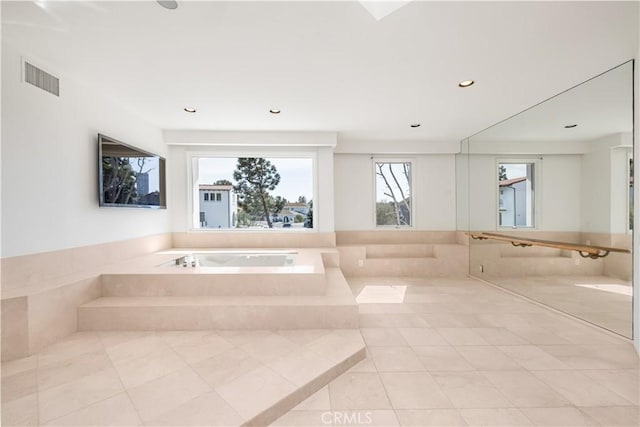 full bathroom featuring recessed lighting, visible vents, a bath, and tile patterned floors