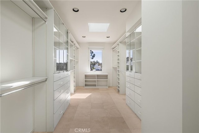 walk in closet with a skylight